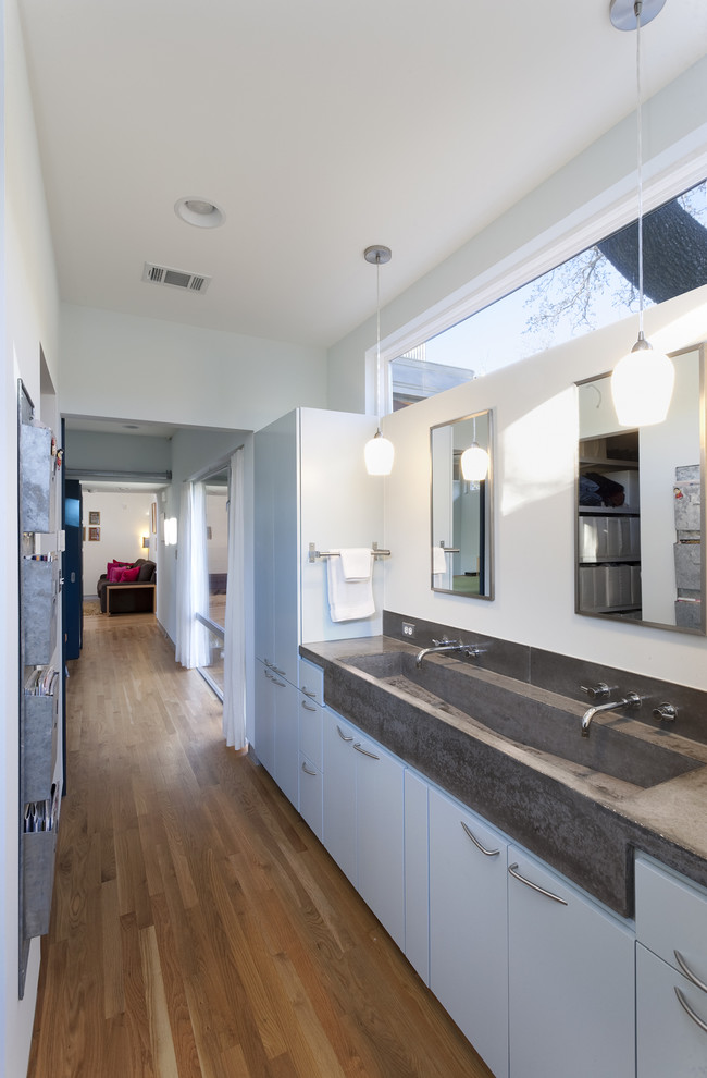 Bathroom - contemporary bathroom idea in Austin with concrete countertops
