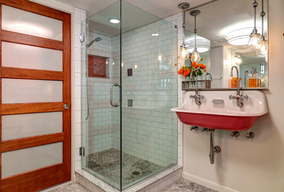 This is an example of a medium sized eclectic bathroom in Other with a one-piece toilet, beige walls, mosaic tile flooring and a wall-mounted sink.