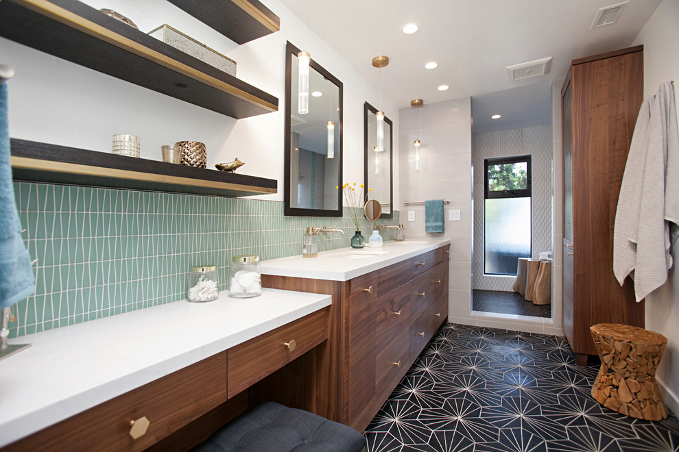 Photo of a contemporary ensuite bathroom in San Diego with flat-panel cabinets, medium wood cabinets, an alcove shower, green tiles, white tiles, white walls, cement flooring, a submerged sink, black floors and an open shower.