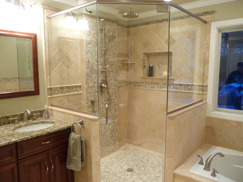 Inspiration for a timeless travertine tile drop-in bathtub remodel in Philadelphia