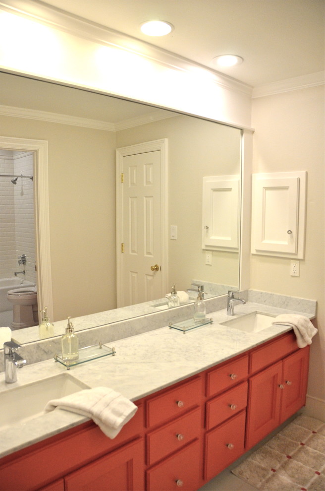 Mid-sized elegant kids' white tile and ceramic tile ceramic tile bathroom photo in Dallas with recessed-panel cabinets, red cabinets, marble countertops, an undermount sink and gray walls