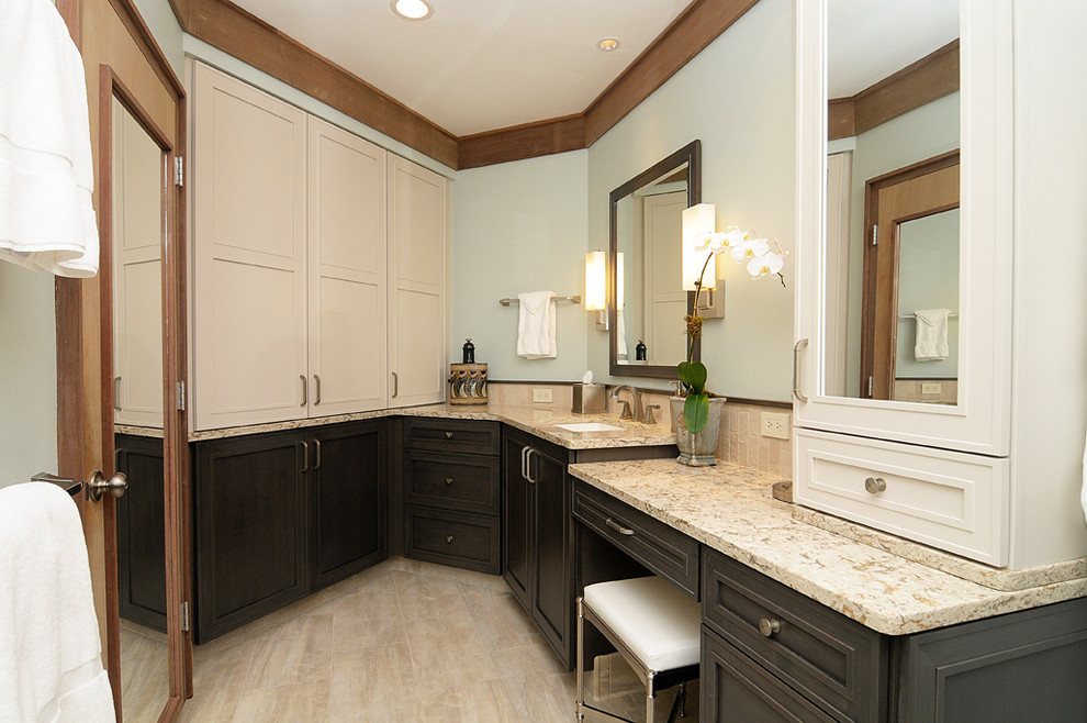 Photo of a classic bathroom in Orlando with a submerged sink, shaker cabinets, beige cabinets and beige tiles.
