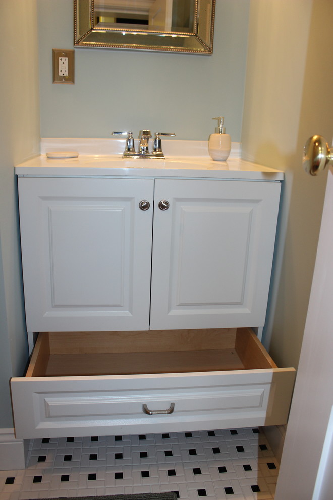 Inspiration for a medium sized traditional ensuite bathroom in Baltimore with a console sink, freestanding cabinets, white cabinets, marble worktops, a built-in bath, a shower/bath combination, a one-piece toilet, white tiles, ceramic tiles, blue walls and ceramic flooring.