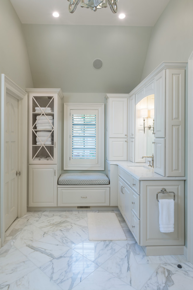 Large elegant master green tile marble floor alcove shower photo in Columbus with raised-panel cabinets, white cabinets, an undermount tub, a two-piece toilet, green walls, an undermount sink, marble countertops and a hinged shower door