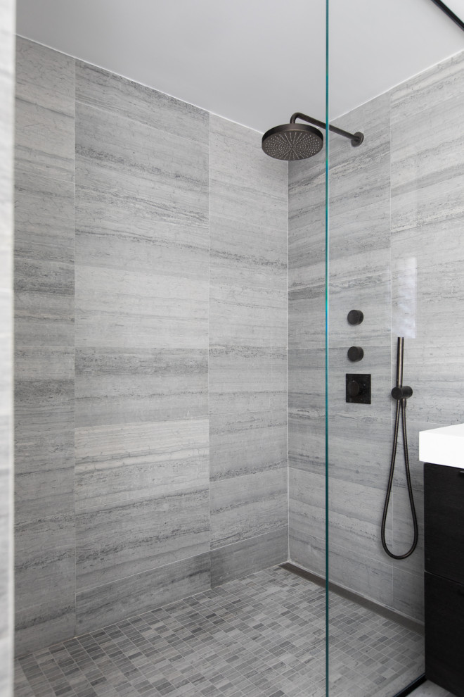 Inspiration for a medium sized contemporary ensuite bathroom in New York with freestanding cabinets, dark wood cabinets, a walk-in shower, grey tiles, marble tiles, grey walls, marble flooring, a wall-mounted sink, grey floors, an open shower, white worktops, a single sink and a floating vanity unit.