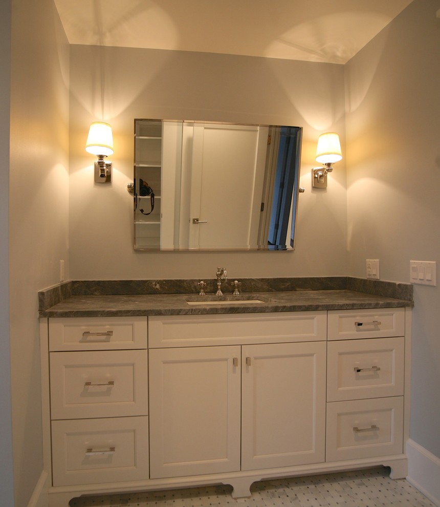 Eclectic bathroom photo in New York with recessed-panel cabinets and white cabinets