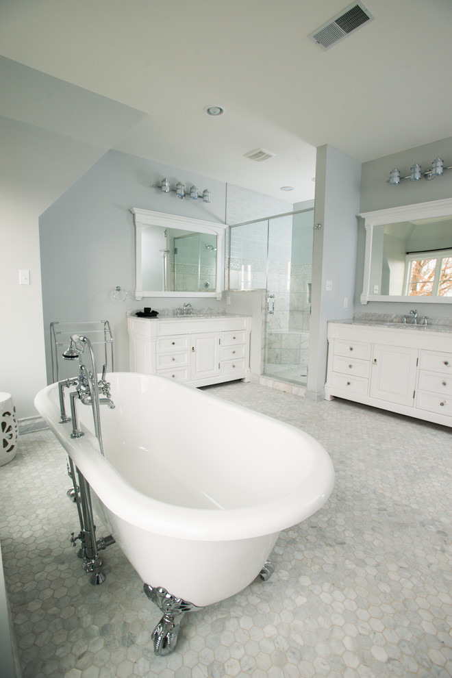 Photo of a large classic ensuite bathroom in Other with raised-panel cabinets, white cabinets, a freestanding bath, a walk-in shower, a one-piece toilet, grey tiles, white tiles, stone tiles, green walls, terracotta flooring, a built-in sink and soapstone worktops.