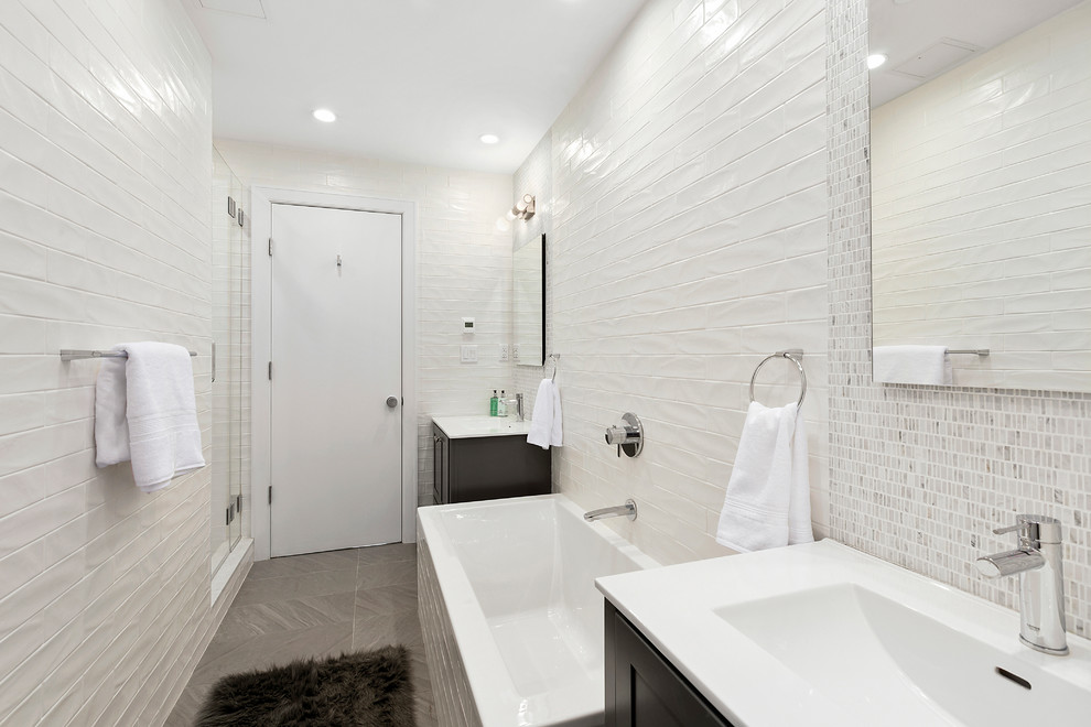 Medium sized traditional ensuite bathroom in New York with shaker cabinets, dark wood cabinets, a submerged bath, an alcove shower, porcelain tiles, white walls, porcelain flooring, an integrated sink, engineered stone worktops, brown floors and a hinged door.
