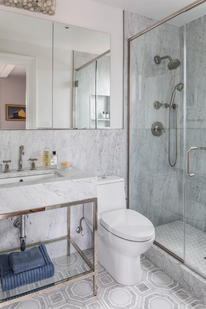 Inspiration for a small traditional shower room bathroom in Denver with open cabinets, grey cabinets, a shower/bath combination, a one-piece toilet, grey tiles, marble tiles, grey walls, marble flooring, a submerged sink, granite worktops, grey floors and a hinged door.