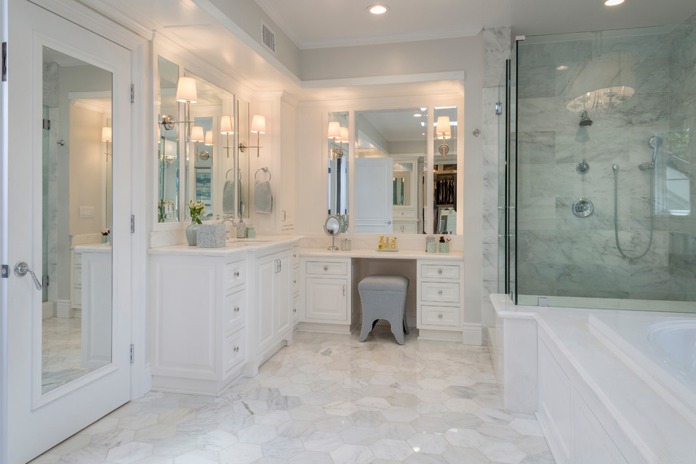 Inspiration for a medium sized contemporary ensuite wet room bathroom in Los Angeles with flat-panel cabinets, white tiles, mosaic tiles, multi-coloured walls, mosaic tile flooring, a submerged sink, limestone worktops and a sliding door.