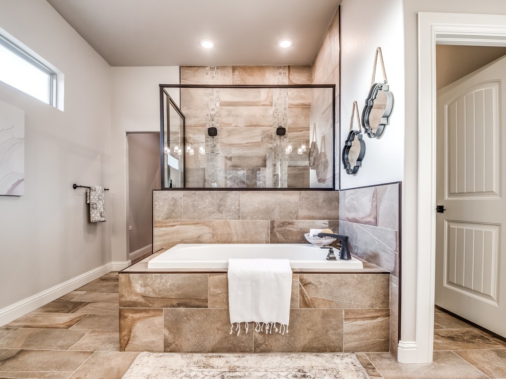 Example of a large farmhouse master multicolored tile and ceramic tile ceramic tile and beige floor bathroom design in Oklahoma City with furniture-like cabinets, white cabinets, a one-piece toilet, beige walls, an undermount sink, granite countertops, a hinged shower door and multicolored countertops