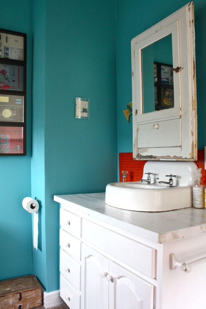 Photo of an eclectic bathroom in San Francisco with a vessel sink.