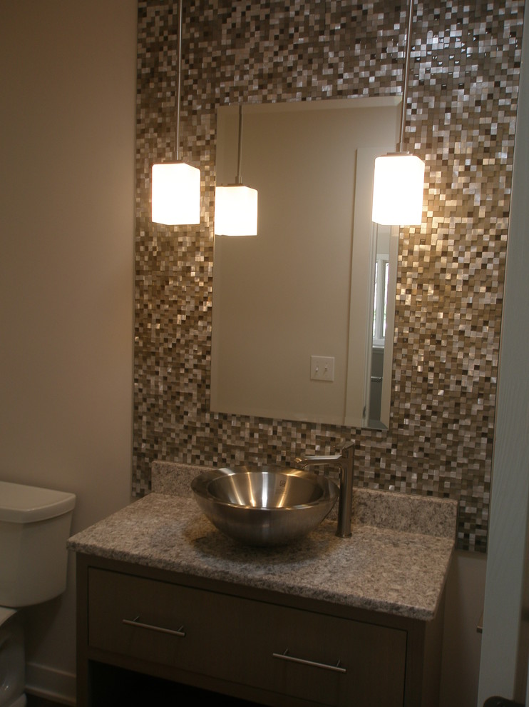 Example of a small minimalist 3/4 beige tile and mosaic tile medium tone wood floor bathroom design in Other with flat-panel cabinets, quartzite countertops, a one-piece toilet, beige walls, medium tone wood cabinets and a vessel sink