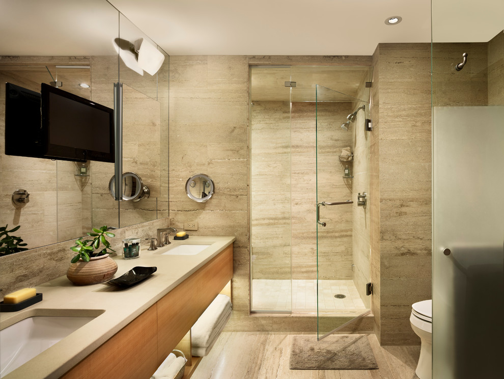 Alcove shower - mid-sized modern master beige tile and stone slab travertine floor alcove shower idea in Philadelphia with flat-panel cabinets, light wood cabinets, a one-piece toilet, an undermount sink and quartzite countertops