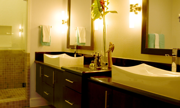 Example of a trendy bathroom design in Houston with flat-panel cabinets, dark wood cabinets and quartzite countertops
