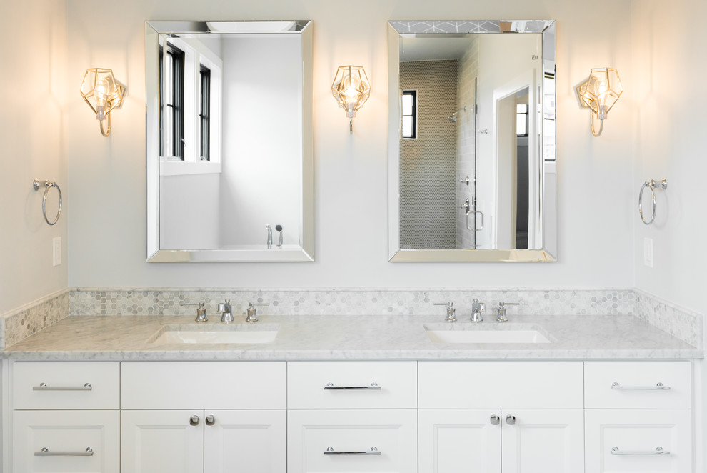 Inspiration for a medium sized country ensuite bathroom in Portland with recessed-panel cabinets, white cabinets, a freestanding bath, a walk-in shower, a one-piece toilet, grey walls, porcelain flooring, a submerged sink, marble worktops, grey floors and a hinged door.