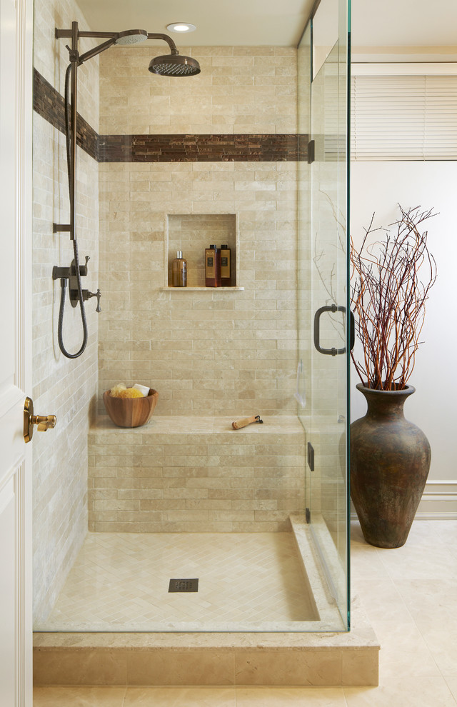 Inspiration for a transitional beige tile bathroom remodel in Toronto with a niche