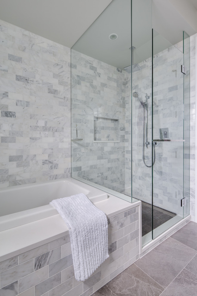 This is an example of a medium sized classic ensuite bathroom in Vancouver with shaker cabinets, white cabinets, a built-in bath, a corner shower, a two-piece toilet, grey tiles, marble tiles, grey walls, porcelain flooring, a submerged sink, engineered stone worktops, grey floors, a hinged door and white worktops.