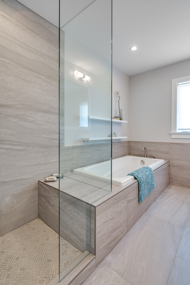 Example of a mid-sized transitional master gray tile and porcelain tile porcelain tile and gray floor bathroom design in Vancouver with shaker cabinets, white cabinets, a two-piece toilet, gray walls, an undermount sink, quartz countertops, a hinged shower door and white countertops