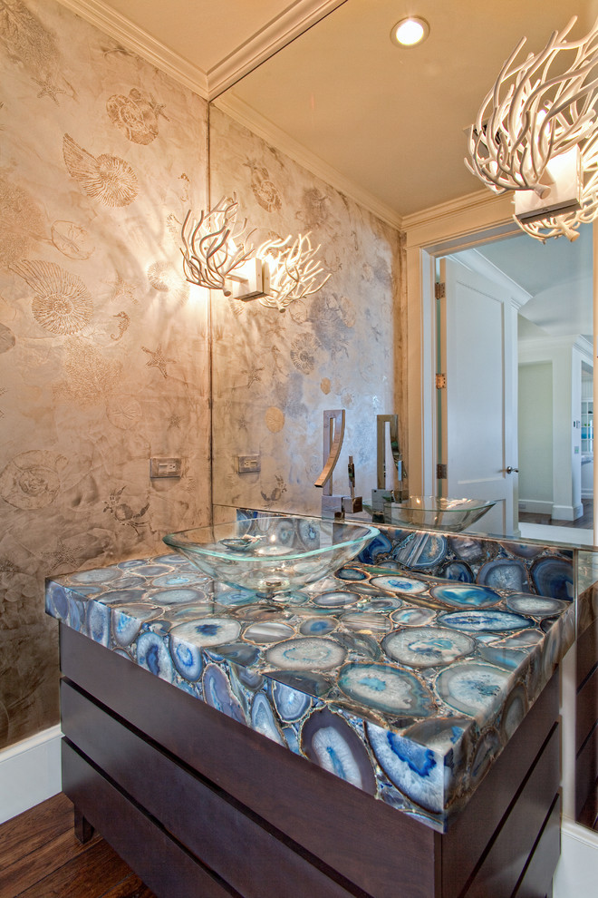 Mid-sized trendy dark wood floor bathroom photo in Miami with a vessel sink, flat-panel cabinets, dark wood cabinets, onyx countertops and blue countertops