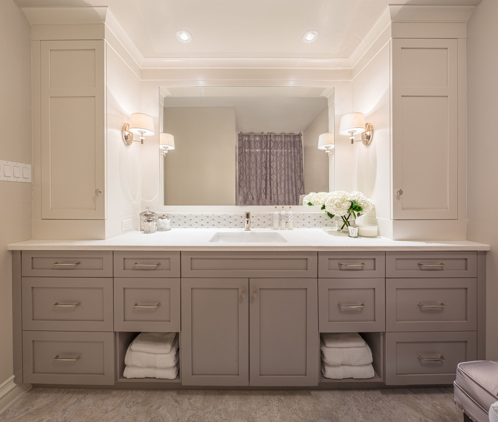 Large classic ensuite bathroom in Ottawa with an integrated sink, shaker cabinets, solid surface worktops, mosaic tiles, white cabinets, white tiles, grey walls and lino flooring.
