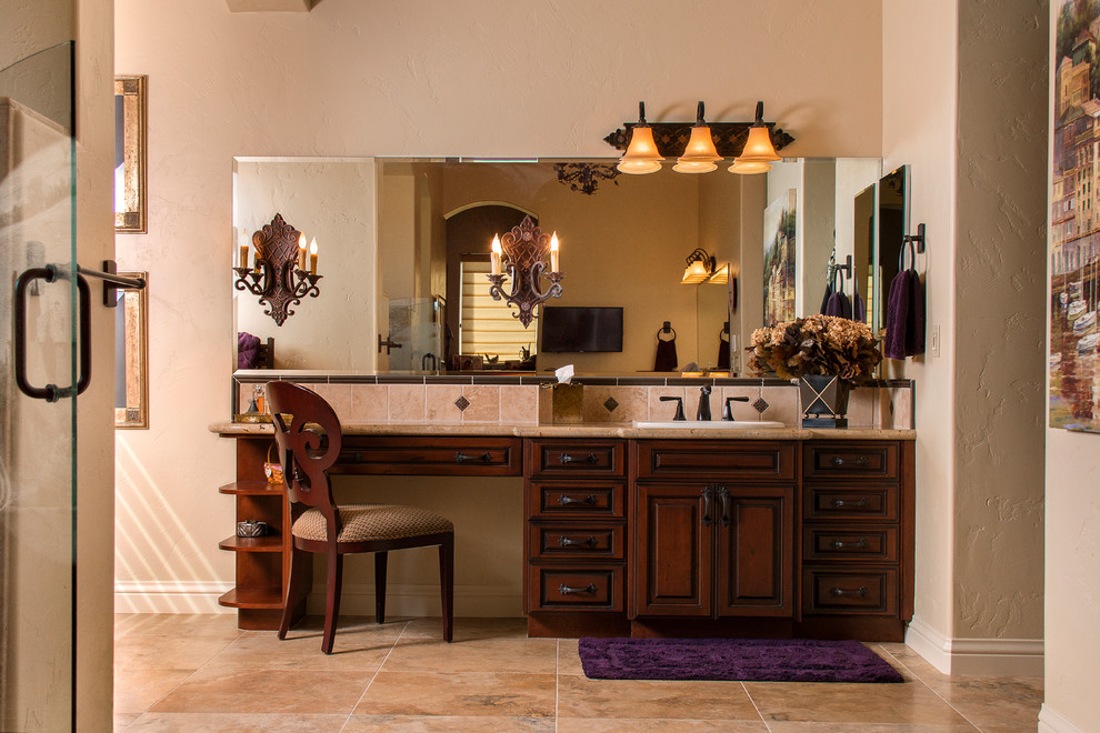 Bathroom - traditional porcelain tile bathroom idea in Other with raised-panel cabinets, dark wood cabinets, yellow walls and granite countertops