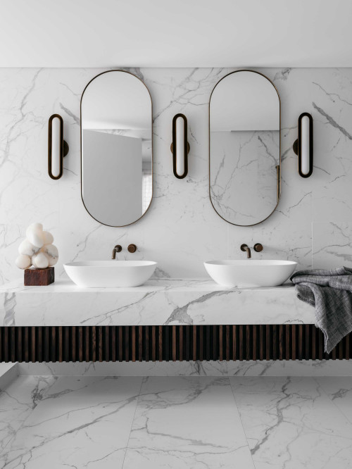 Sophisticated Bathroom with Marble Backsplash and Dark Wood Cabinet