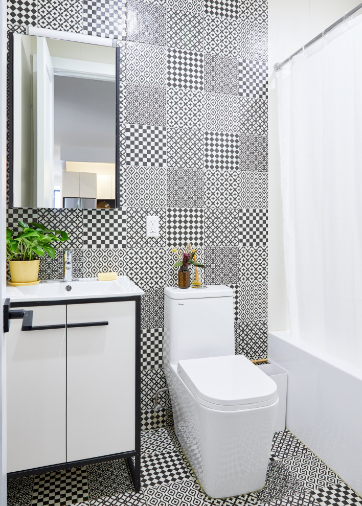 Inspiration for a contemporary black and white tile single-sink bathroom remodel in New York with flat-panel cabinets, white cabinets, a one-piece toilet, a console sink and a freestanding vanity