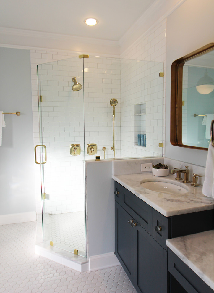 Bathroom - large victorian master white tile and subway tile mosaic tile floor bathroom idea in Atlanta with shaker cabinets, blue cabinets, a two-piece toilet, blue walls, an undermount sink and quartzite countertops