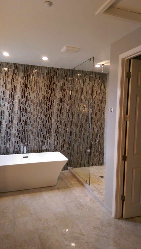 Contemporary bathroom in Phoenix with beige tiles, porcelain tiles and marble worktops.
