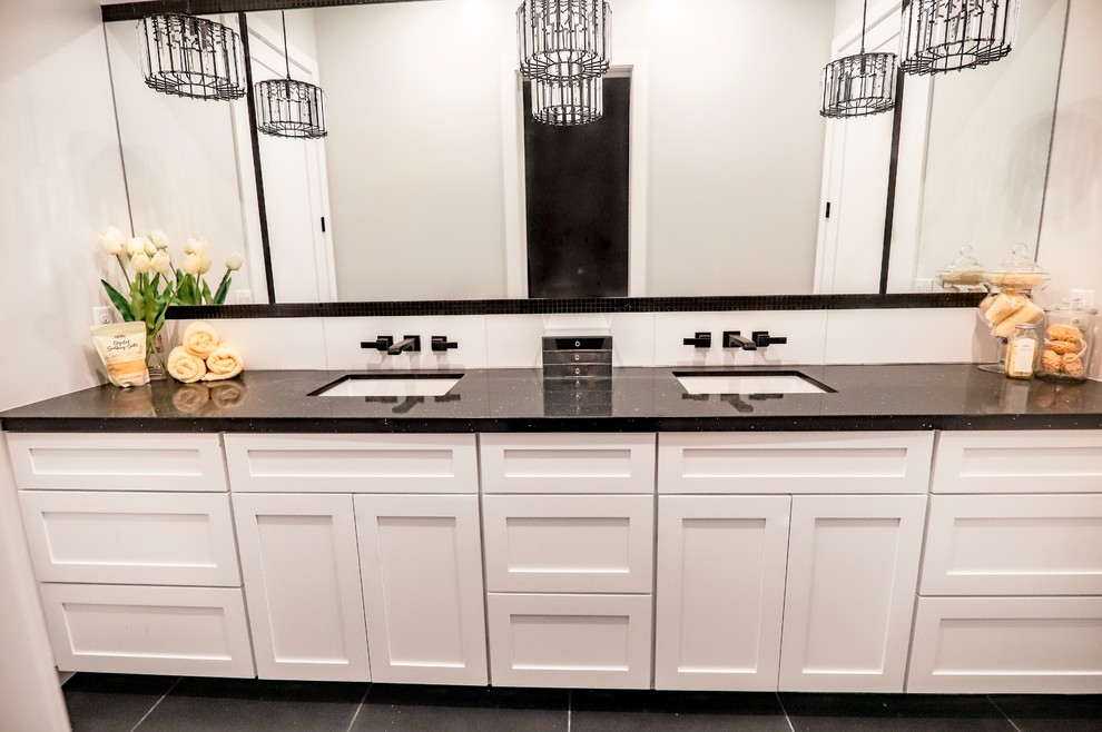 Bathroom - large contemporary kids' black and white tile and ceramic tile ceramic tile and black floor bathroom idea in Phoenix with shaker cabinets, white cabinets, an undermount tub, a two-piece toilet, gray walls, an undermount sink, quartz countertops and black countertops