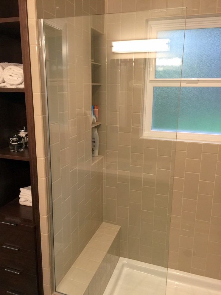 Vertical two size subway tile walk in shower Traditional Bathroom