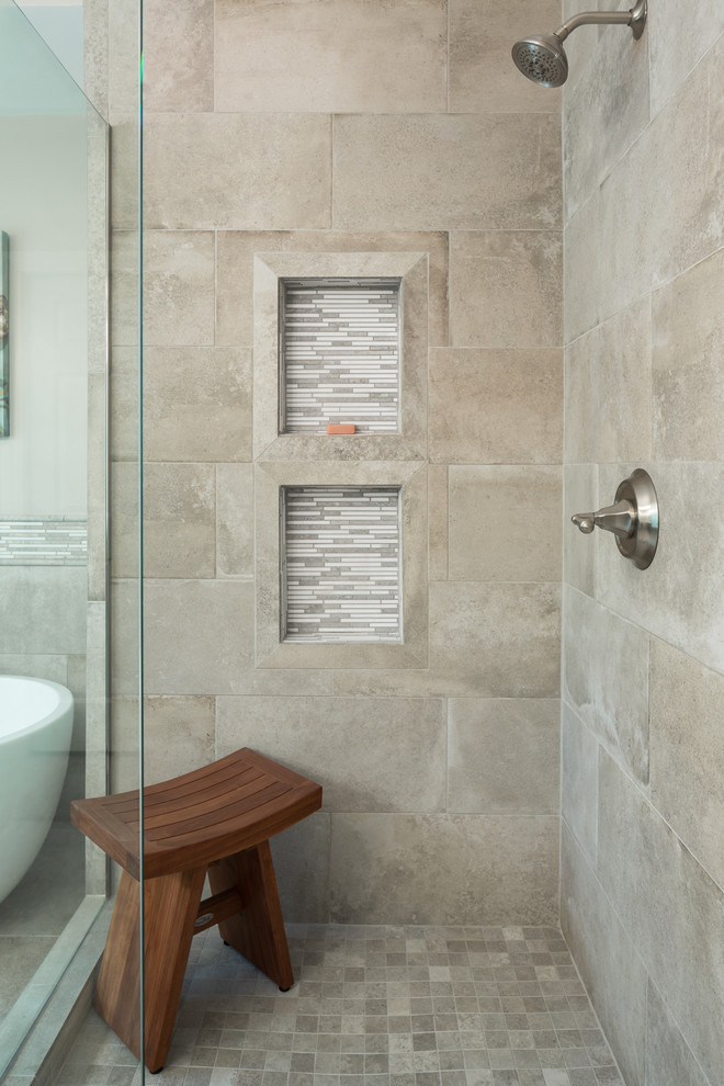 Bathroom - mid-sized transitional master beige tile and porcelain tile porcelain tile and beige floor bathroom idea in Birmingham with recessed-panel cabinets, dark wood cabinets, a one-piece toilet, gray walls, an undermount sink, quartz countertops and a hinged shower door