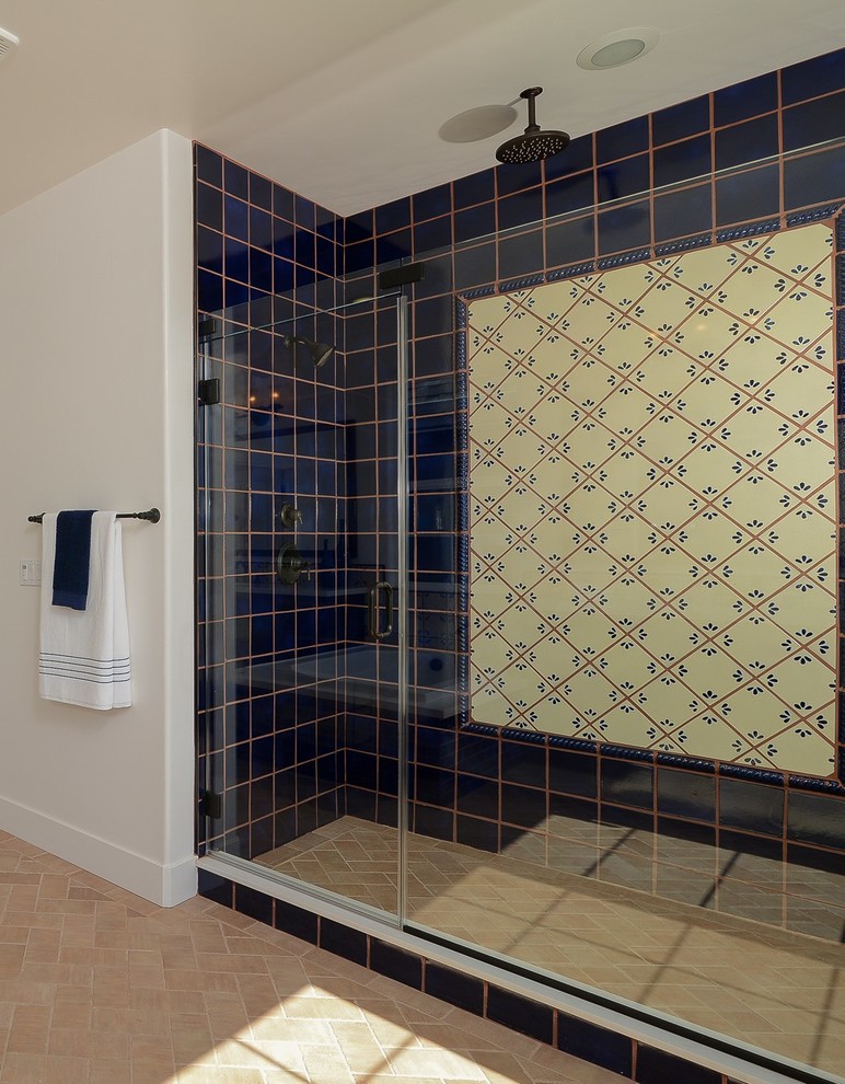 Expansive classic ensuite bathroom in Sacramento with raised-panel cabinets, dark wood cabinets, a built-in bath, a walk-in shower, a one-piece toilet, multi-coloured tiles, metro tiles, white walls, terracotta flooring, a submerged sink and engineered stone worktops.