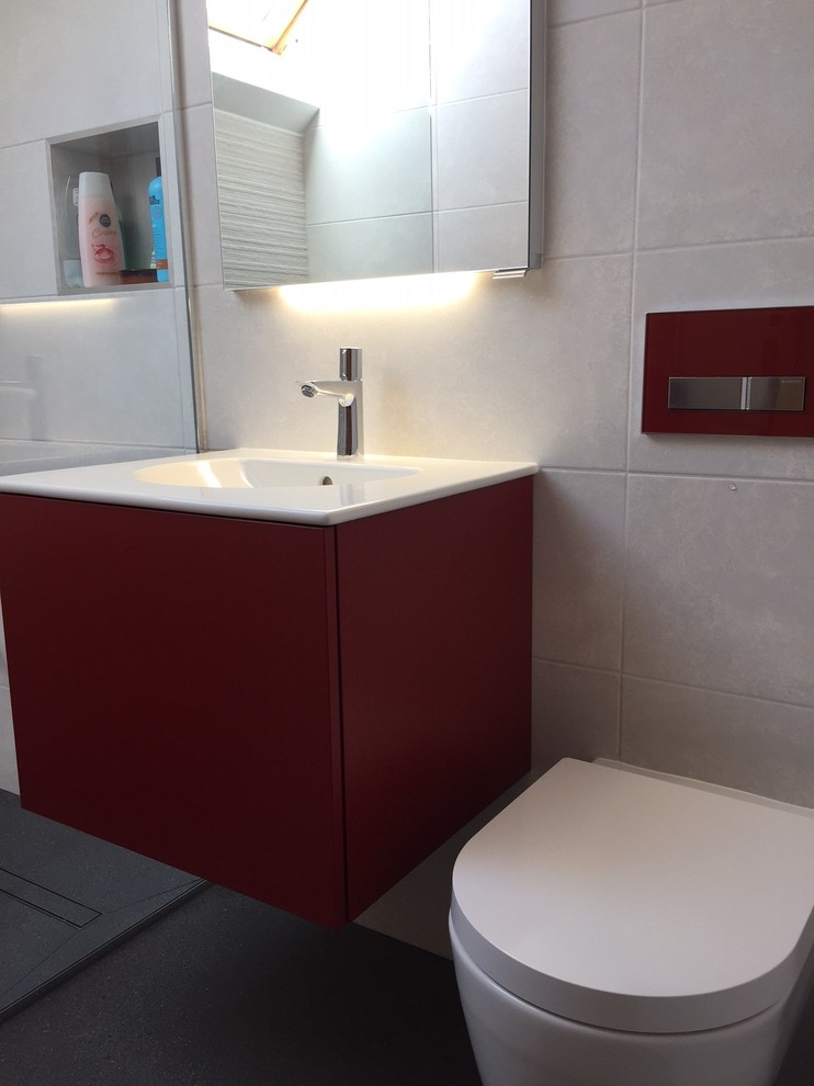 Inspiration for a mid-sized modern 3/4 white tile and ceramic tile porcelain tile doorless shower remodel in Dorset with flat-panel cabinets, red cabinets, a wall-mount toilet and a wall-mount sink