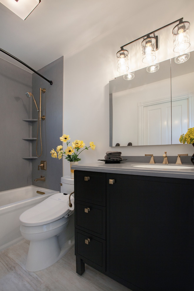 Inspiration for a small victorian ensuite bathroom in San Francisco with freestanding cabinets, black cabinets, an alcove bath, a shower/bath combination, white walls, vinyl flooring, a submerged sink, solid surface worktops, beige floors, a shower curtain and grey worktops.