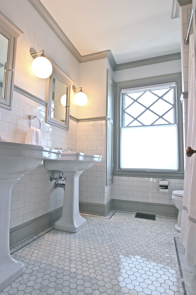 Example of a small classic white tile and subway tile marble floor bathroom design in Boston with a pedestal sink