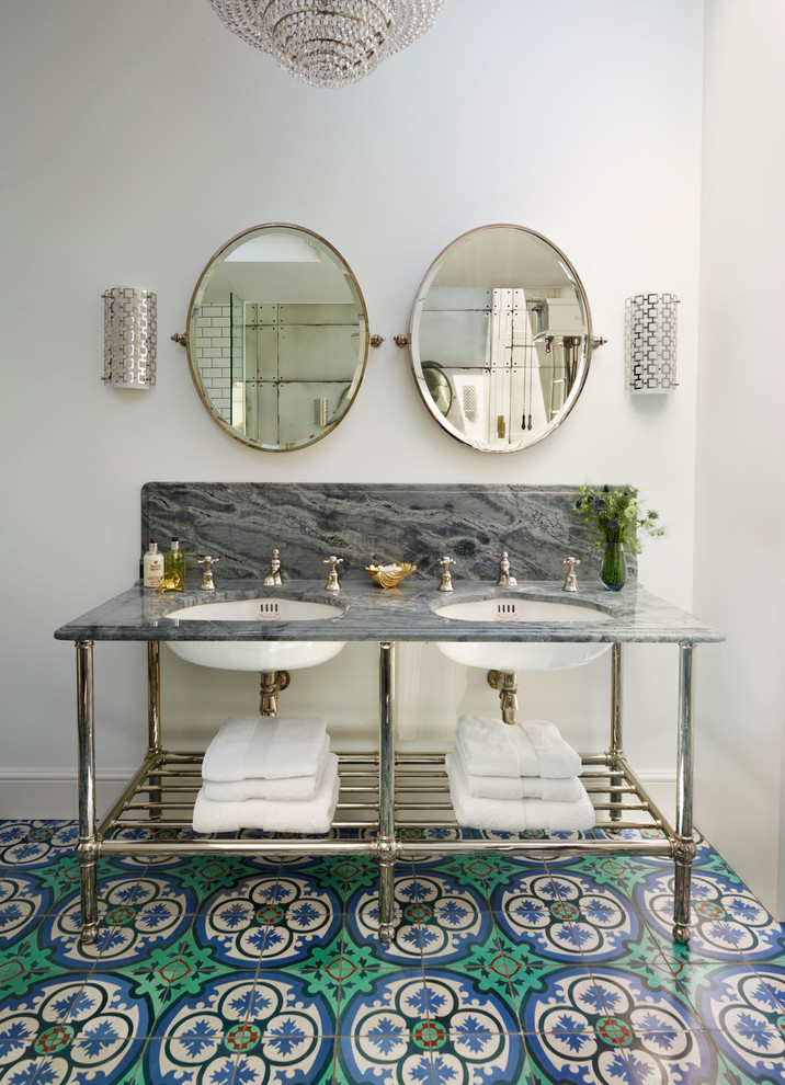 Victorian ensuite bathroom in London with multi-coloured tiles, white walls, a submerged sink, multi-coloured floors and feature lighting.