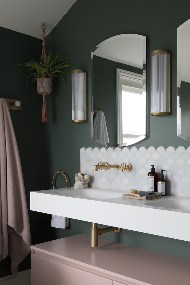 Inspiration for a medium sized bohemian ensuite bathroom in Kent with a freestanding bath, a walk-in shower, a wall mounted toilet, green walls, marble flooring, solid surface worktops, an open shower, white worktops, a wall niche, double sinks, a floating vanity unit and a vaulted ceiling.