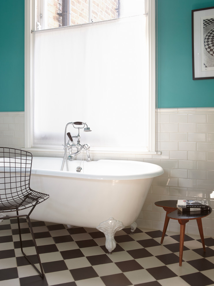 This is an example of a traditional half tiled bathroom in London.
