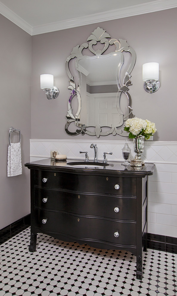 Large classic ensuite bathroom in Detroit with a submerged sink, freestanding cabinets, black cabinets, granite worktops, a claw-foot bath, a built-in shower, a two-piece toilet, white tiles, metro tiles, grey walls and porcelain flooring.