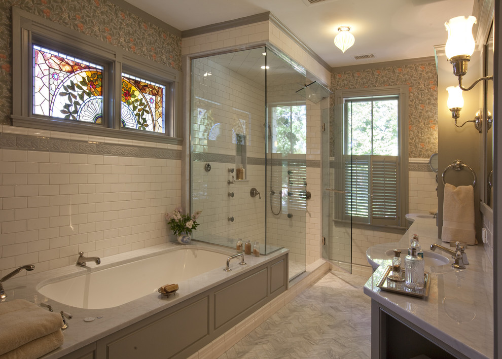 This is an example of a victorian bathroom in Boston with metro tiles.