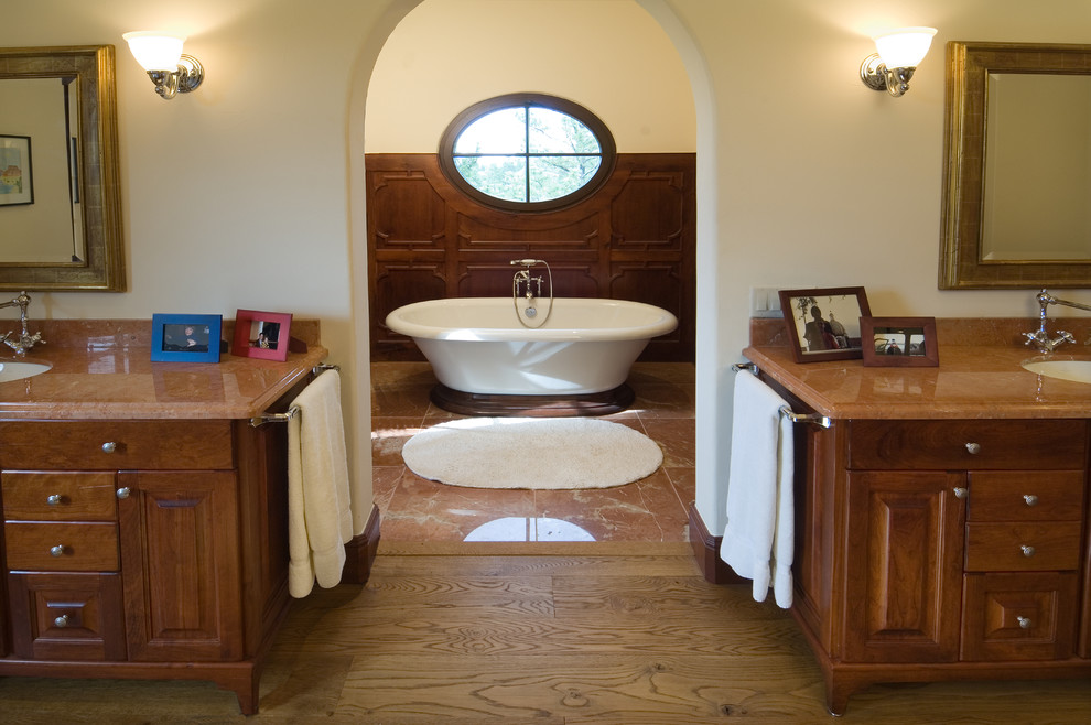 Example of a tuscan bathroom design in Denver