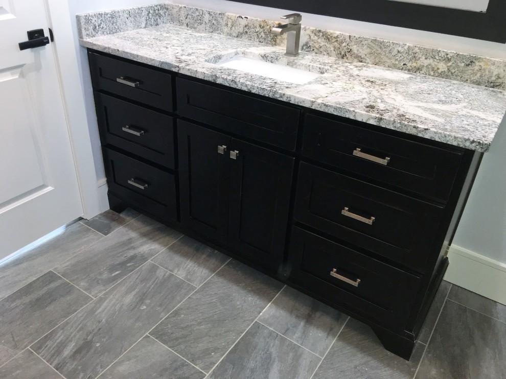 Bathroom - mid-sized transitional master gray tile and ceramic tile ceramic tile bathroom idea in Atlanta with shaker cabinets, black cabinets, gray walls, an undermount sink and granite countertops