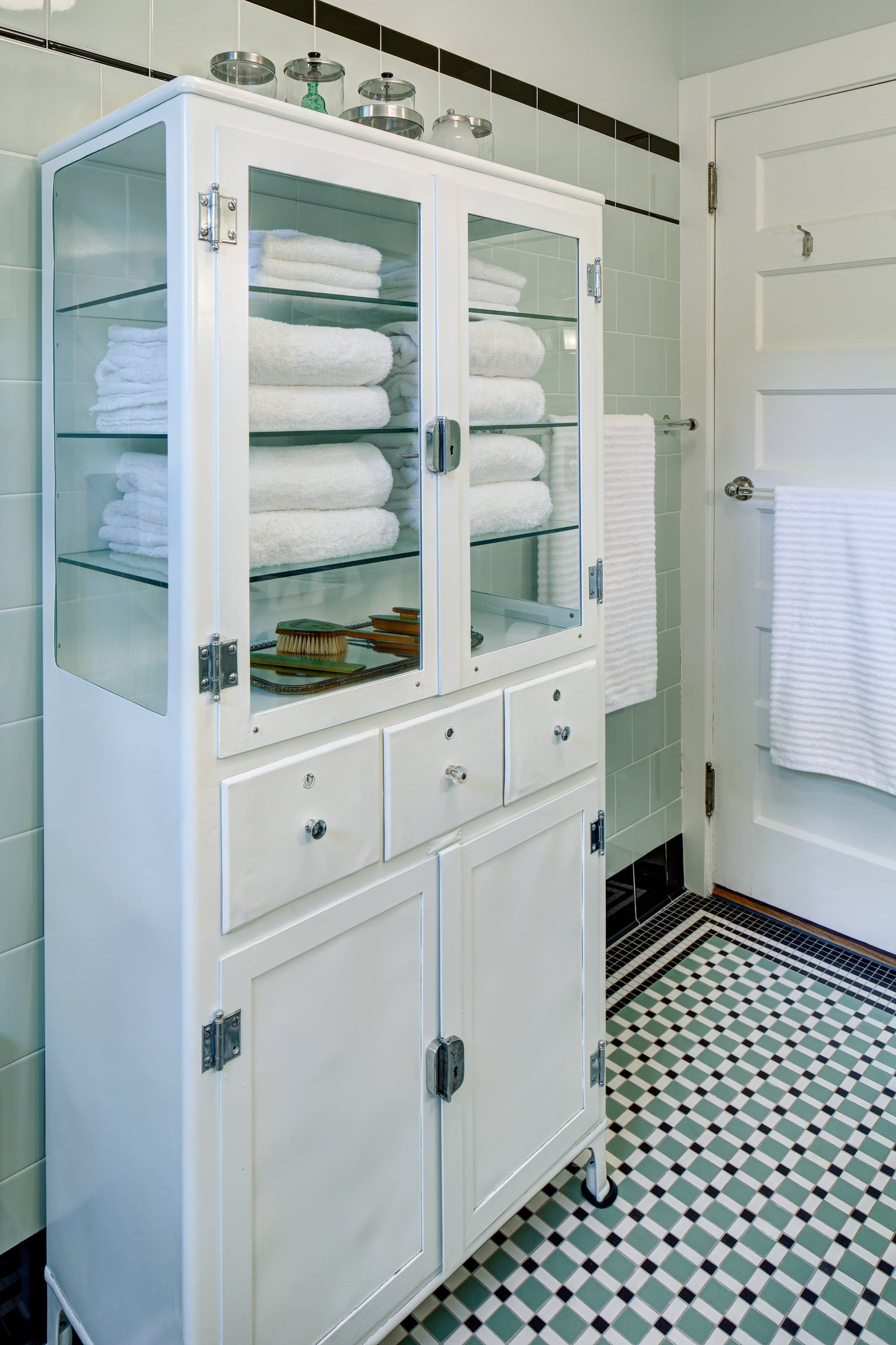 Room of the Day A Family Bath With Vintage Apothecary Style