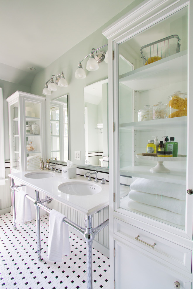 Inspiration for a small classic family bathroom in Other with a console sink, beaded cabinets, white cabinets, engineered stone worktops, a built-in bath, a shower/bath combination, a two-piece toilet, white tiles, ceramic tiles, green walls and mosaic tile flooring.
