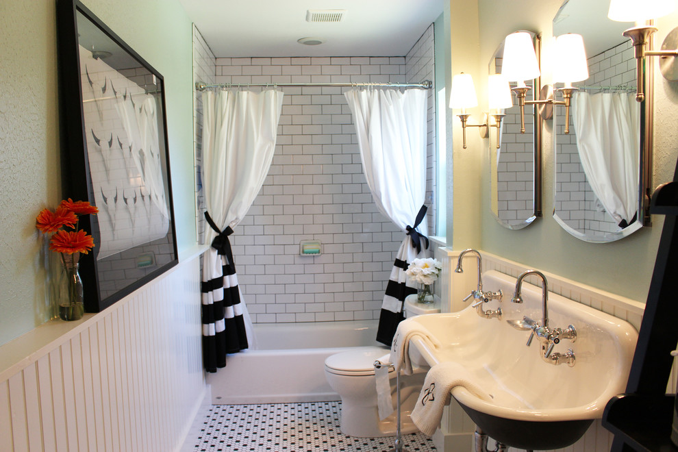 Inspiration for a timeless ceramic tile ceramic tile alcove bathtub remodel in Houston with a trough sink and green walls