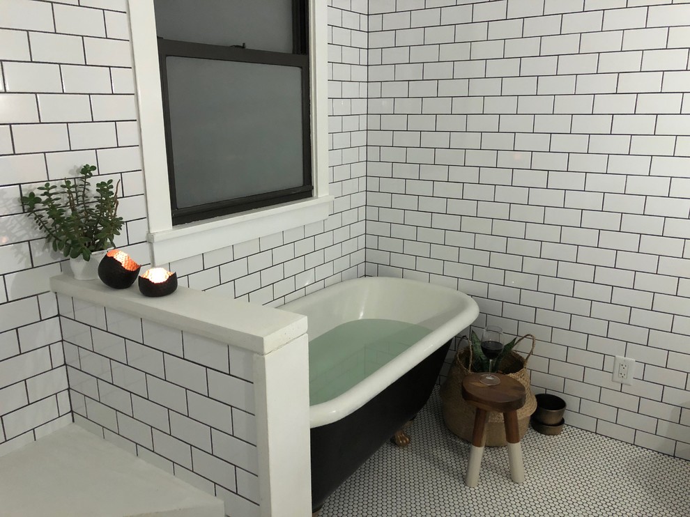 Design ideas for a medium sized modern ensuite wet room bathroom in St Louis with freestanding cabinets, medium wood cabinets, a claw-foot bath, a one-piece toilet, white tiles, ceramic tiles, white walls, ceramic flooring, a trough sink, wooden worktops, white floors and an open shower.