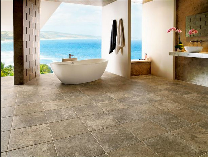 Ispirazione per un'ampia stanza da bagno design con vasca freestanding, pareti marroni, lavabo a bacinella, pavimento in vinile e top in marmo