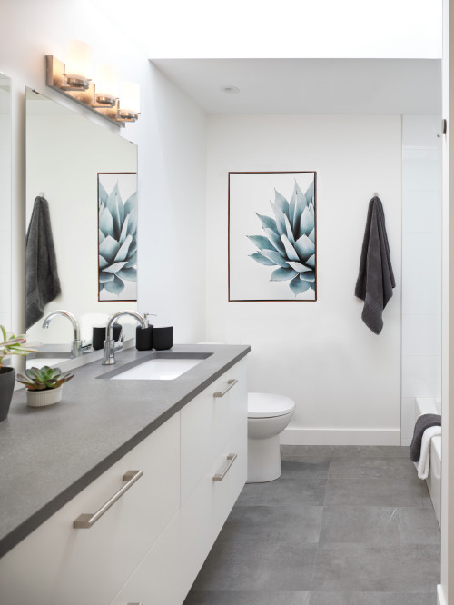 Black and Blue Artistry: Elevate Your Bathroom with a White Vanity and Bathroom Art Ideas